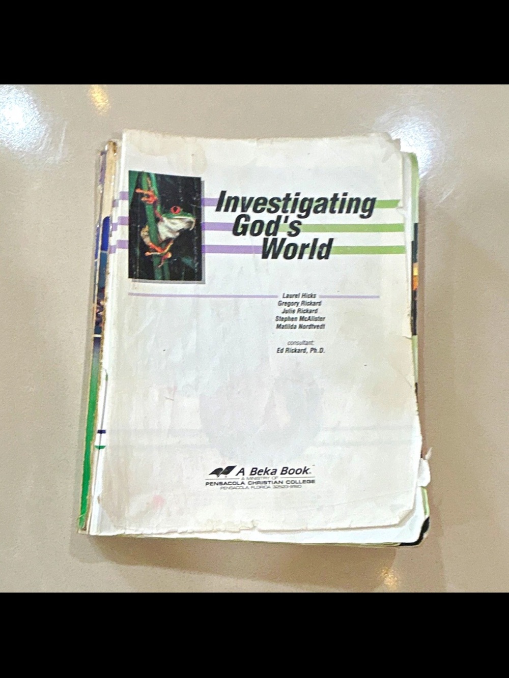 Investigating God's World Textbook - White with Green & Purple Accents